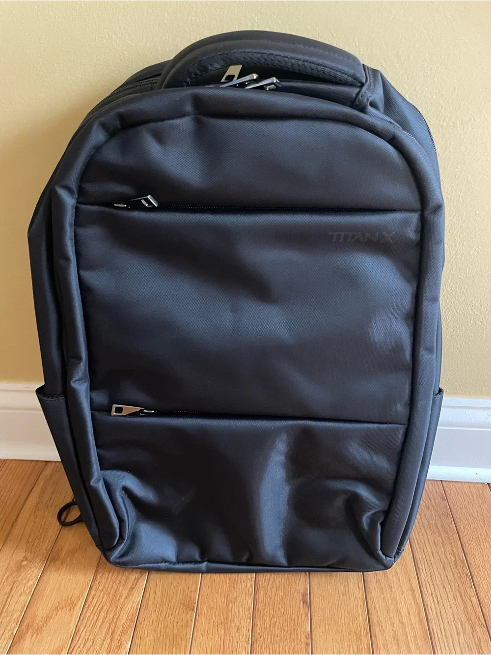 Titan x Black Backpack with Front Zip Pockets waterproof. 20L